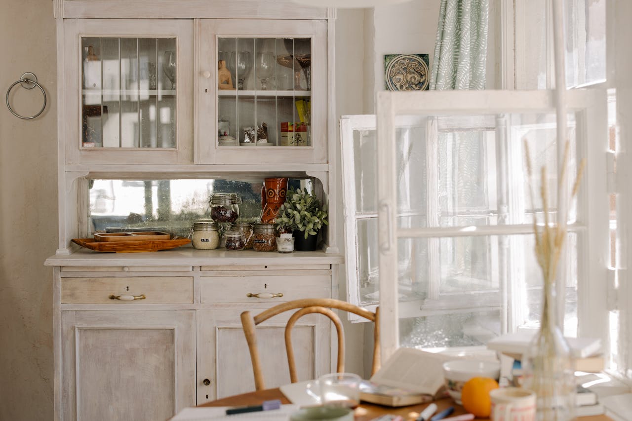 about-us Warm and inviting kitchen with vintage decor, ideal for lifestyle and interior design themes.